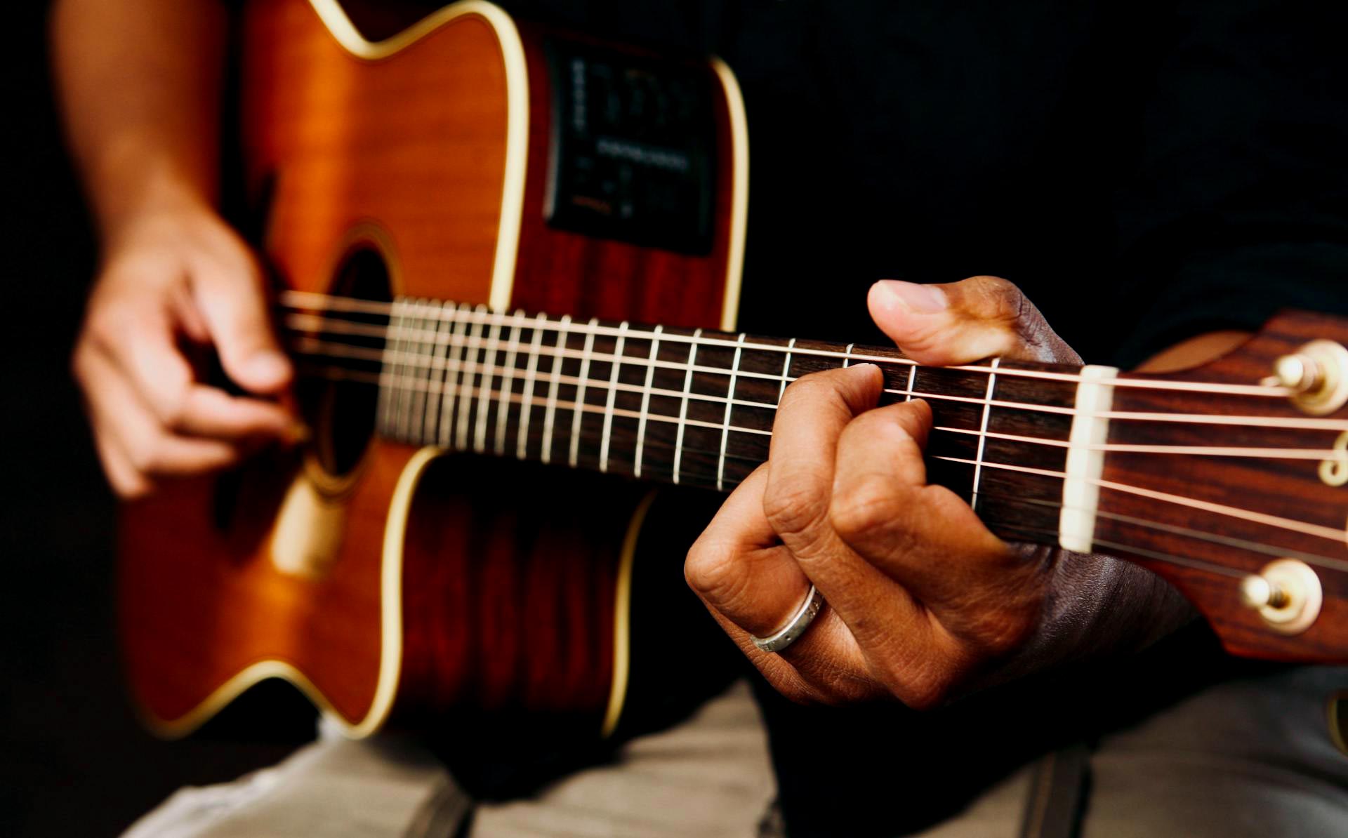 man playing guitar